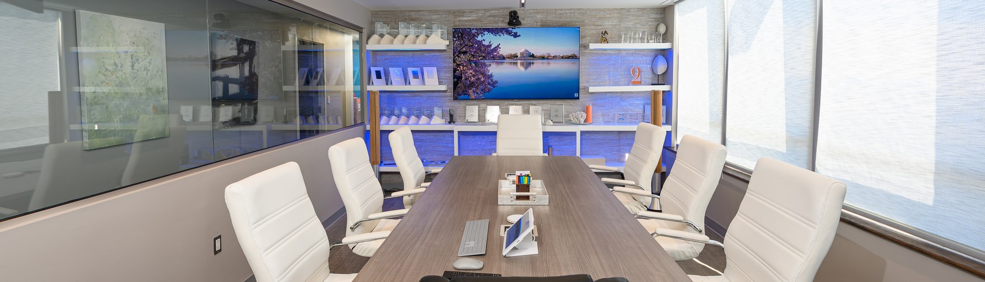 Conference room with integrated technology and window shades