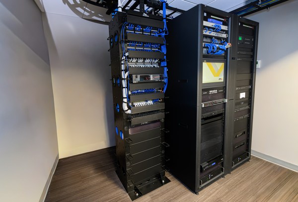 Network and equipment racks with organized patching